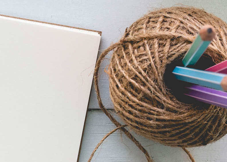 notebook and colorful pencils small